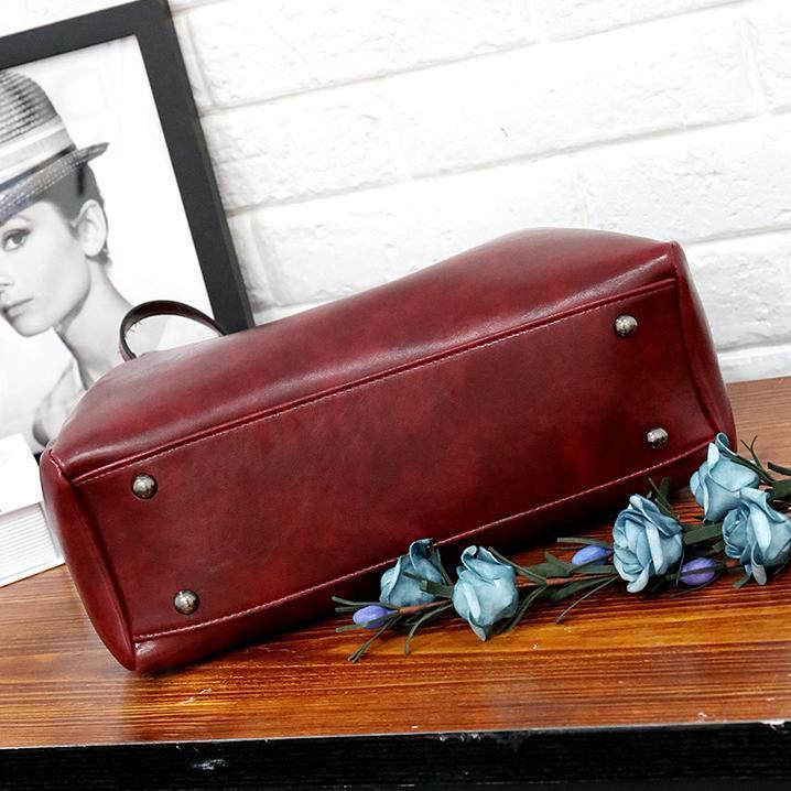 Conjunto elegante de piel Addison de Vega Madrid, con detalles sofisticados en acabado de alta calidad.