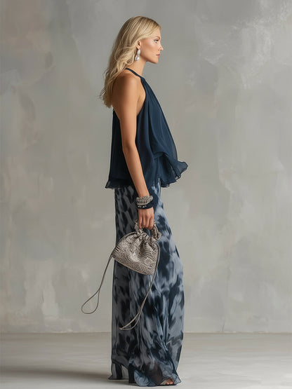 Conjunto elegante Bianca de Vega Madrid con blusa fluida y pantalón palazzo en tonos neutros, vista de la prenda completa.