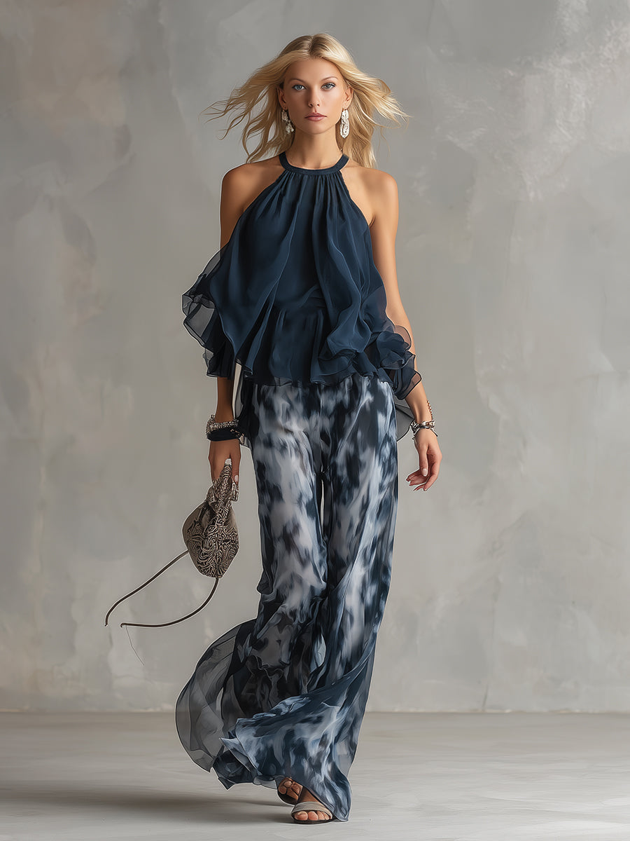 Conjunto elegante Bianca de Vega Madrid con blusa fluida y pantalón palazzo en color neutro, vista frontal del conjunto completo.