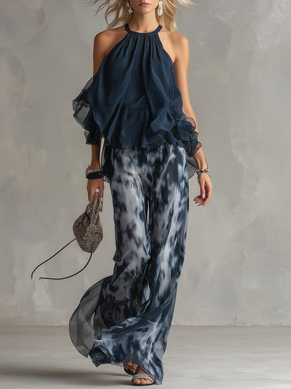 Conjunto elegante Bianca de Vega Madrid con blusa fluida y pantalón palazzo en color neutro, estilo sofisticado y moderno.