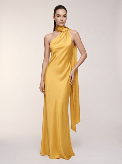 Vestido Mistral Aurora de Vega Madrid, vestido largo con estampado floral y mangas largas, estilo elegante y moderno.