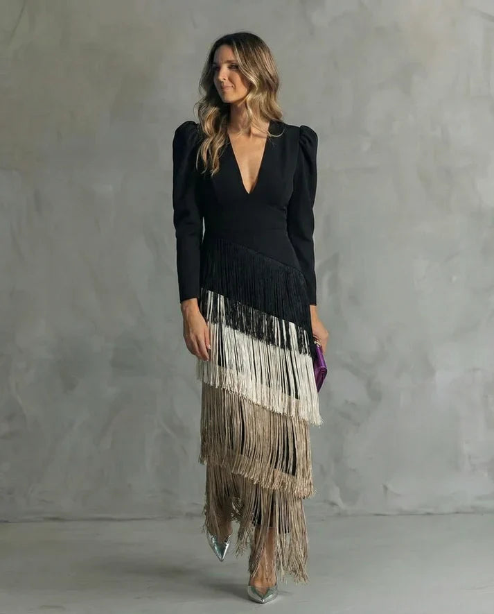 Vestido elegante con mangas de flecos